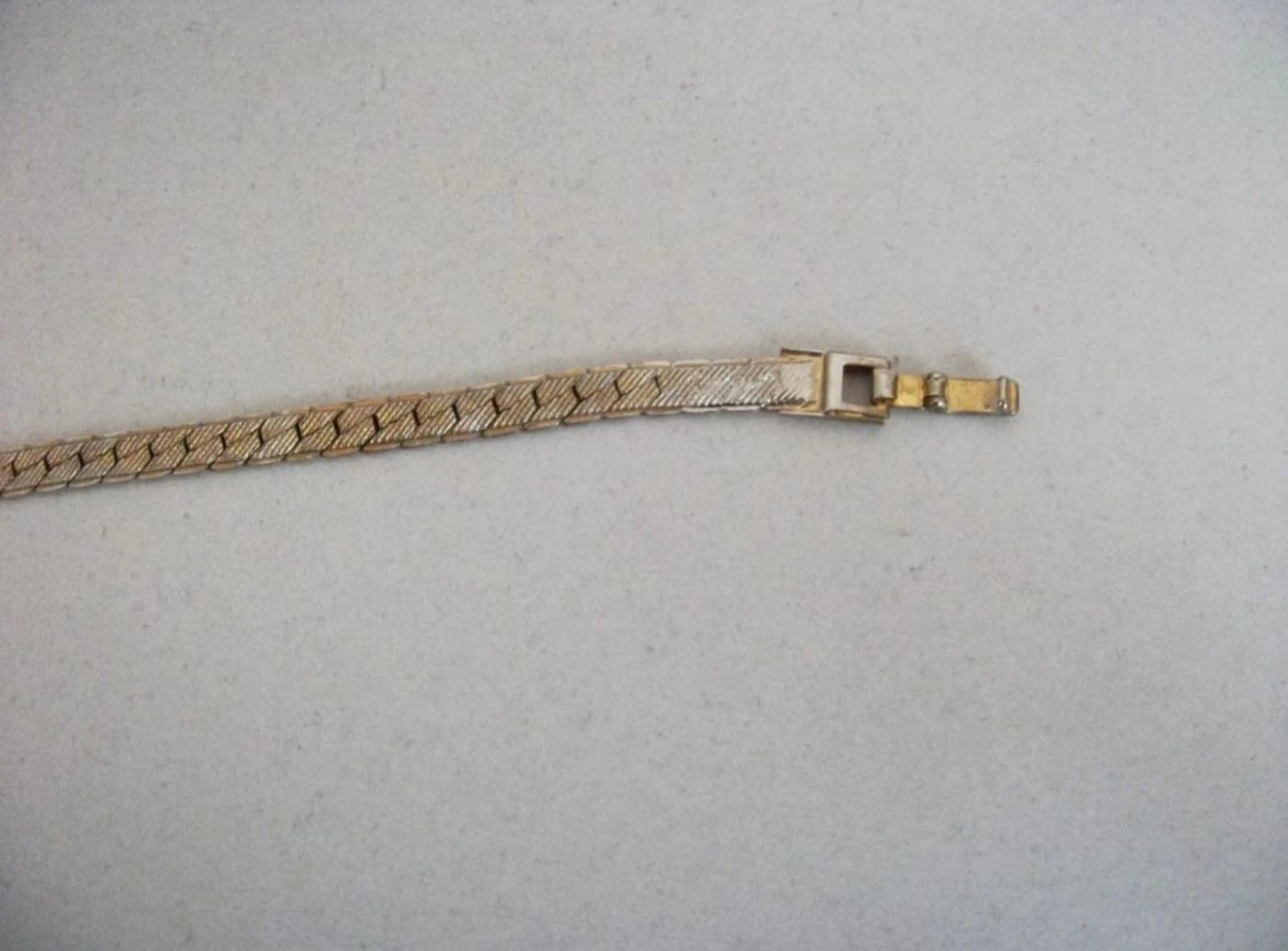 Gouden sieradenarmband van metaal – photo 8